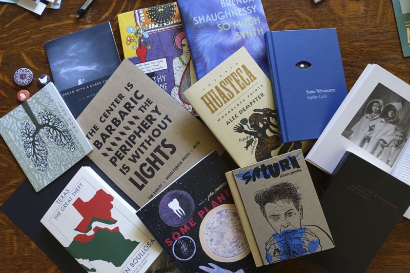 Books I brought home from the large book fair at AWP 2016.